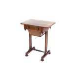A Victorian rosewood work table, fitted with a single drawer, raised on slat end supports,