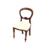 Three Victorian mahogany dining chairs, having upholstered seats and backs, raised on turned
