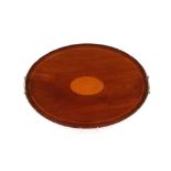 An oval mahogany and satinwood inlaid Sheraton design tea tray, with brass carrying handles, 64cm