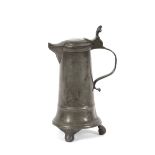 A 19th Century pewter lidded jug, 30cm high