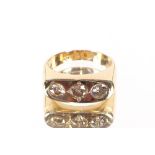 A 18ct gold and diamond three stone ring