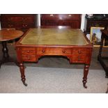 A 19th Century mahogany writing table, fitted opposing arrangements of one long and four short
