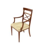 A set of 8 Edwardian mahogany and satinwood cross-banded dining chairs, having crossed rail backs,