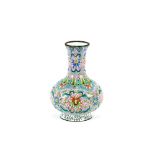 A Chinese enamel baluster vase, profusely decorated with flowers on a pink ground, 20cm high