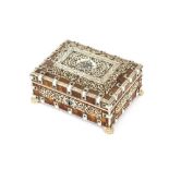An Indian tortoise shell and ivory inlaid trinket box, the hinged lid decorated with a central