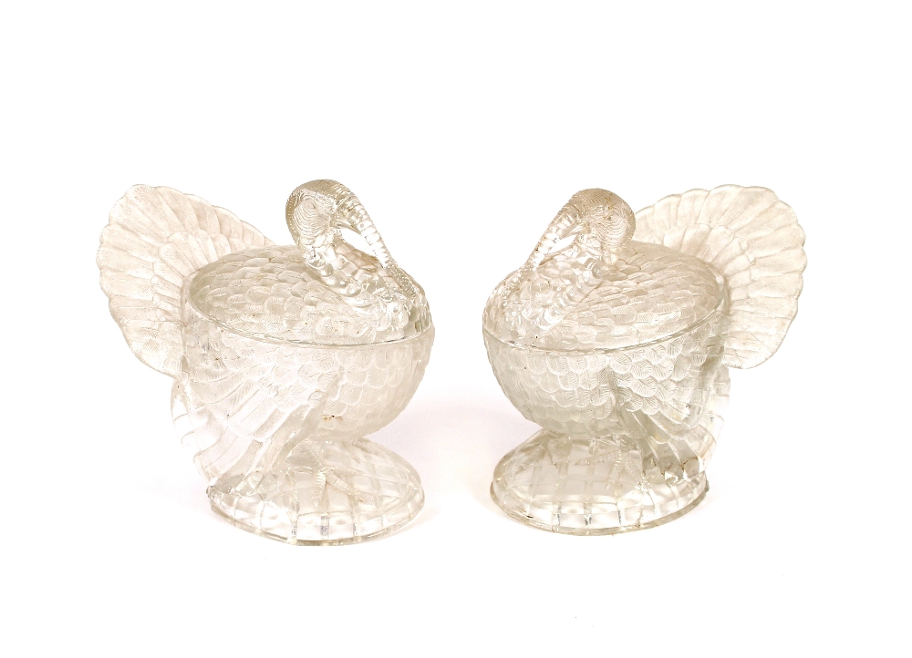 A pair of moulded glass tureens, in the form of turkeys, 22cm high