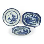 Two octagonal 18th Century Nankin blue and white meat platters; and a blue and white charger with