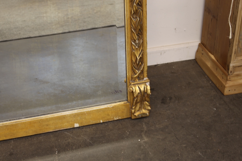 A 19th Century French gilt wood pier glass, having arched bevelled rectangular mirrored plate, the - Image 3 of 3