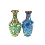 A Chinese cloisonné baluster vase, decorated scrolling foliage on a green ground; and another