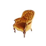 A Victorian rosewood spoon back armchair, upholstered in buttoned Dralon, acanthus scroll arms,