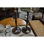 A pair of carved mahogany table lamp bases