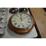 A mahogany cased circular wall clock, the dial sig