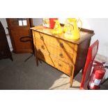 An oak chest fitted three drawers