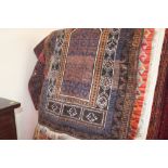 An approx 3'8" x 2'6" Eastern patterned rug