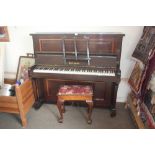 A Boyd of London mahogany upright piano