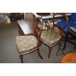 A pair of mahogany dining chairs