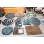 A quantity of decorative plates and plaques