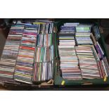 Two boxes of CDs