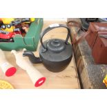 A cast iron pot (105)