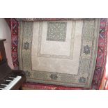 An approximate 6'6" x 4'5" patterned rug