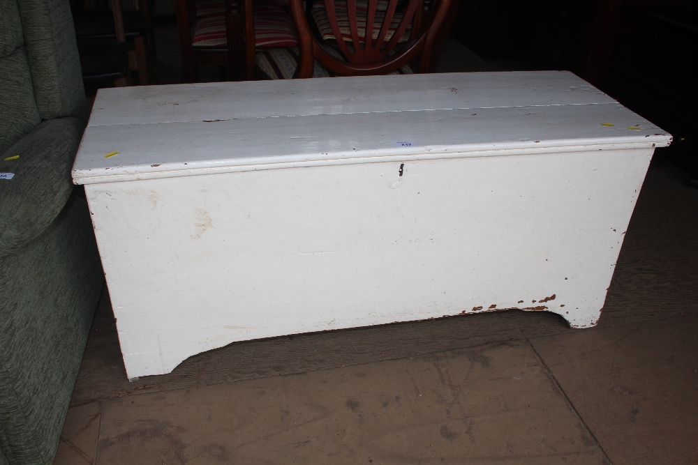 A white painted pine storage box with candle box