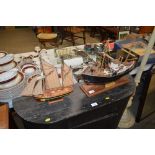 Two wooden model boats