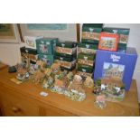 A collection of Lilliput Lane model houses, and ei