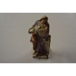 A 19th Century pottery figurine "Charity"