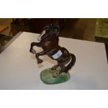 A Beswick brown glazed horse