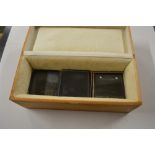 A pine box of glass slides