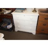 A white painted pine chest, fitted three long draw