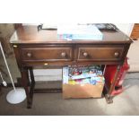An Ercol two drawer sideboard