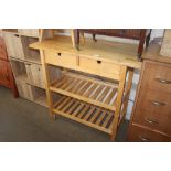 A beech kitchen trolley fitted two drawers
