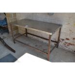 Stainless steel top harness cleaning table.