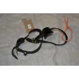 Pair of safety straps for collar.