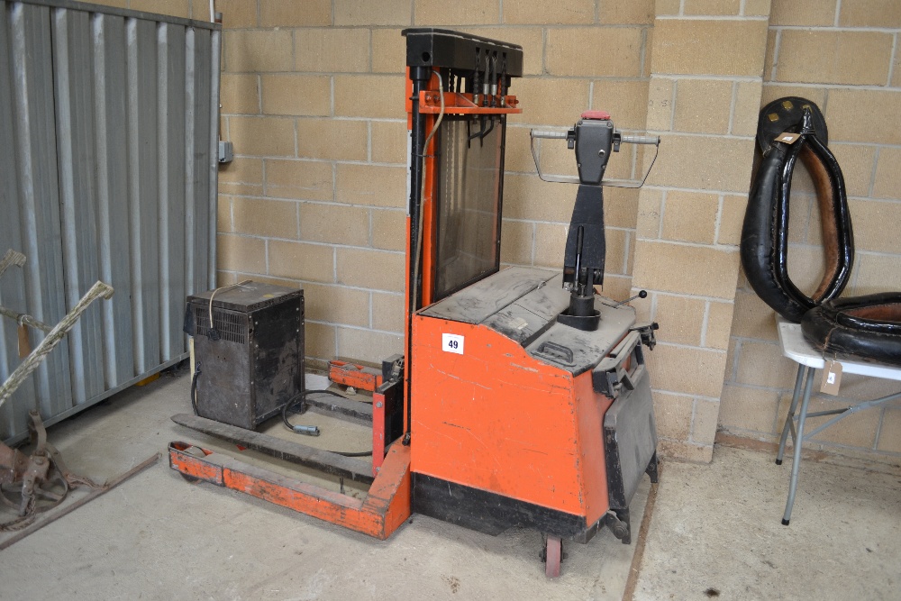 Titon electric forklift with charger.