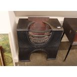 A cast iron fire grate basket, 55cm wide x 58cm hi