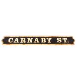 A heavy cast metal "Carnaby Street" sign, 110cm lo