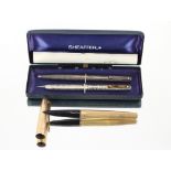 A Sheaffer Sterling USA propelling pencil and pen,