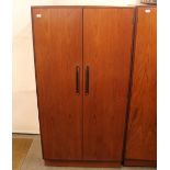 A teak G-plan gentleman's wardrobe, 91cm wide