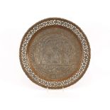 An Eastern copper and white metal circular wall plaque, havin