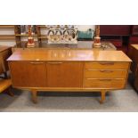 A G-plan design long teak sideboard, fitted three