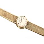 An Omega gent's 9ct gold wrist watch, with mesh st