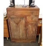 An Art Deco limed oak tallboy, fitted with an arra