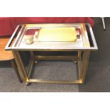 A Vintage gold colour two tier drinks trolley, 82c