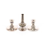 A pair of plated dwarf candlesticks inscribed Guar