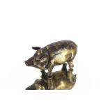 A brass Vesta in the form of a pig