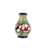 A Moorcroft baluster vase with floral decoration o