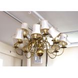 A Dutch style brass 8 branch chandelier