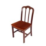 A set of four Danish teak dining chairs